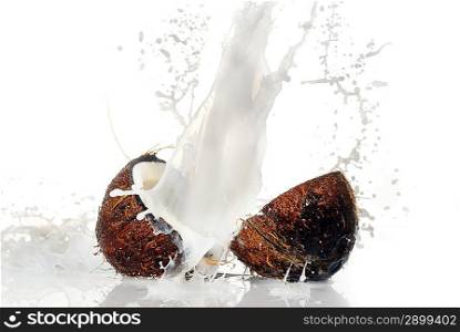 cracked coconut with big splash, isolated
