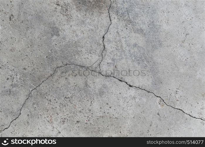 Cracked concrete wall surface of rough texture background for design in your work.