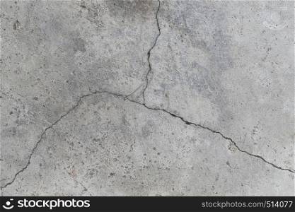 Cracked concrete wall surface of rough texture background for design in your work.