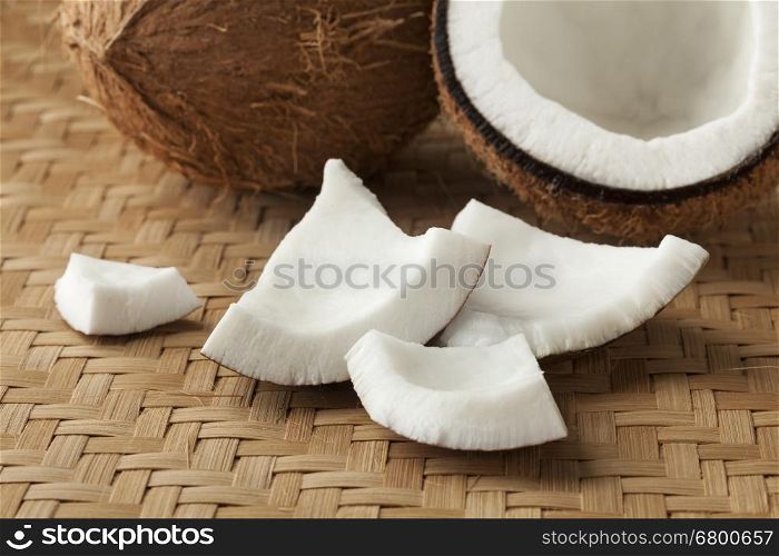 Cracked fresh coconut with pieces