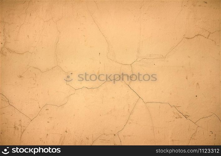 Cracked wall background golden