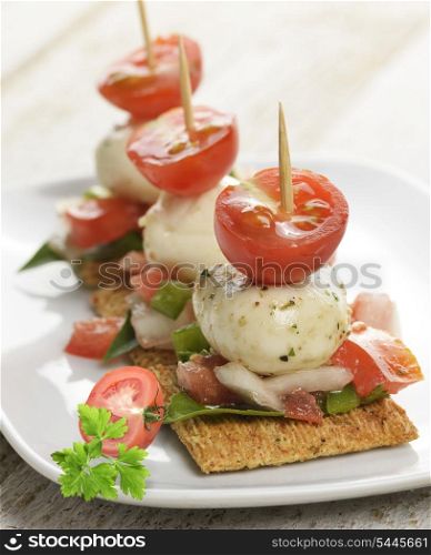 Crackers With Mozzarella Cheese And Tomatoes
