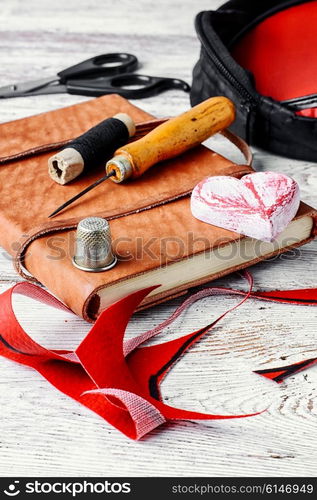 crafts with leather and tools for sewing. needlework and sewing