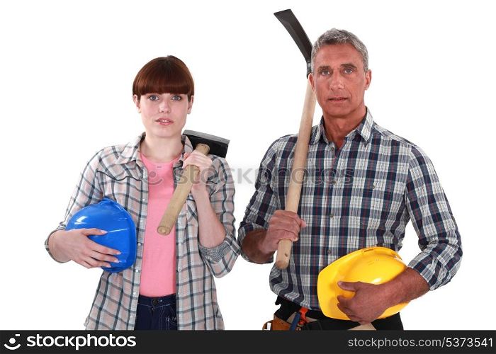 craftsman and craftswoman posing together