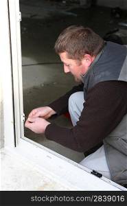 craftsman crewing a window