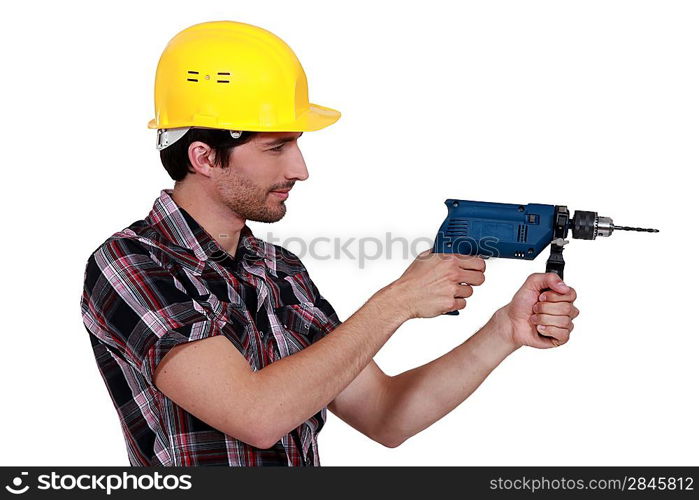 craftsman holding a drill