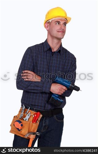 Craftsman holding a drill
