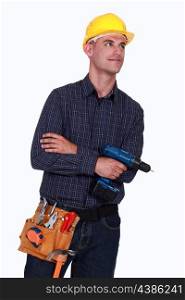 Craftsman holding a drill
