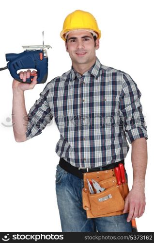 craftsman holding a drill