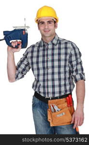 craftsman holding a drill