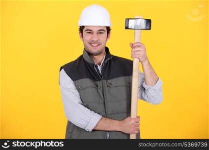 craftsman holding a hammer