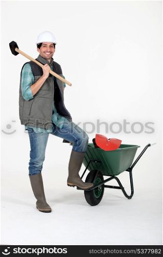 craftsman holding a huge hammer
