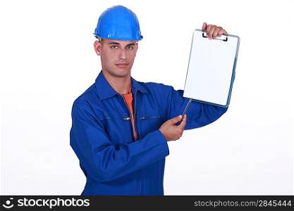 craftsman holding a notepad