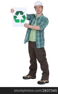 craftsman holding a recycling label