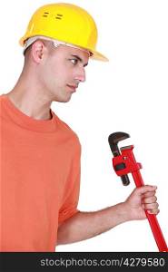 craftsman holding a spanner