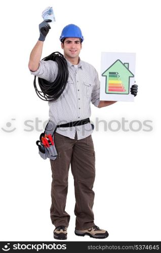 craftsman holding an energy consumption label and money in cash