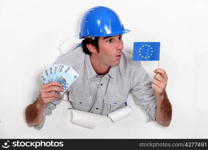 craftsman holding european flag and bank notes