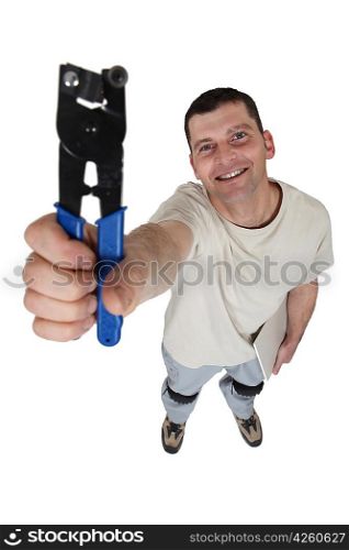 craftsman holding pliers