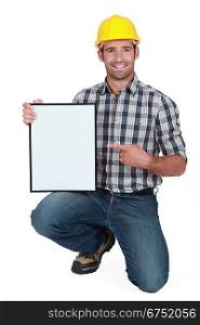 craftsman pointing at a blank board