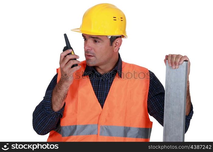 Craftsman using a walkie-talkie