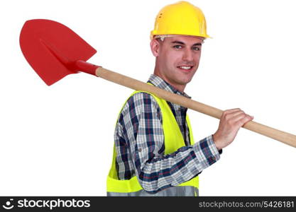craftsman with shovel on his shoulder
