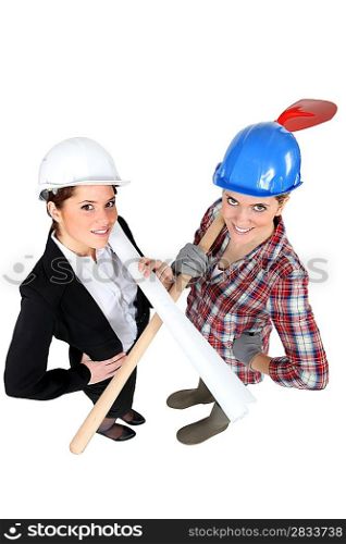 craftswoman and businesswoman posing together
