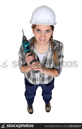 craftswoman holding a drill