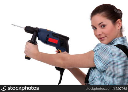 craftswoman holding a drill