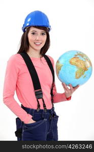 craftswoman holding a globe