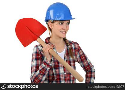 Craftswoman holding a shovel