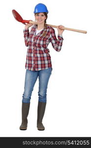 Craftswoman holding a shovel