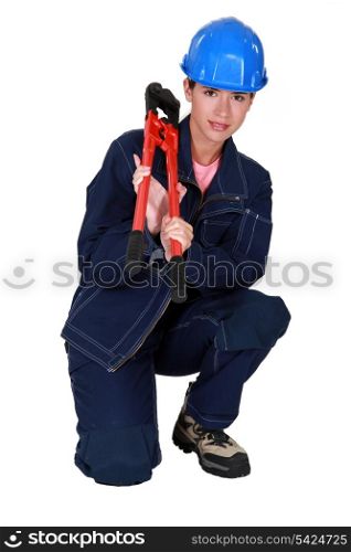 Craftswoman holding a spanner