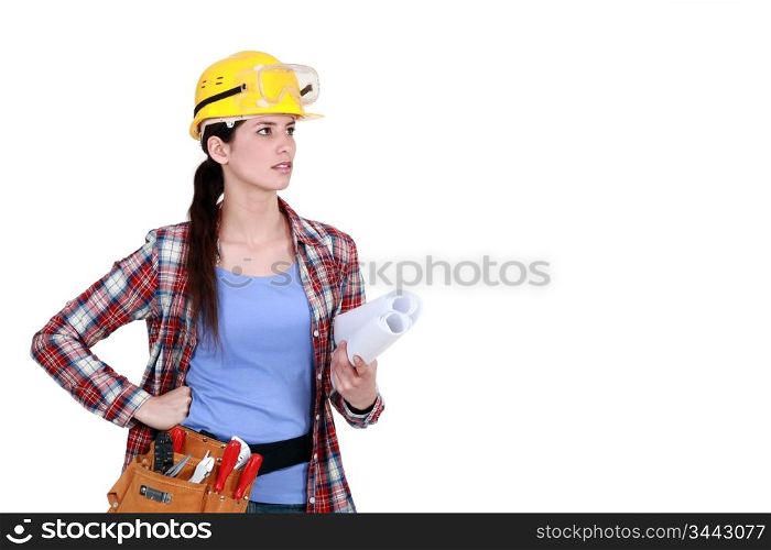 craftswoman holding blueprints
