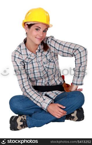 Craftswoman sitting cross-legged