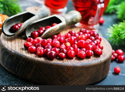 cranberry drink and berries, christmas drink in glass and on a table