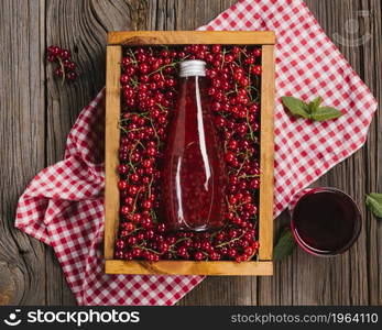 cranberry juice bottle wooden background. High resolution photo. cranberry juice bottle wooden background. High quality photo