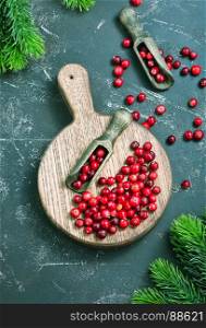 cranberry on wooden table, fresh cranberry