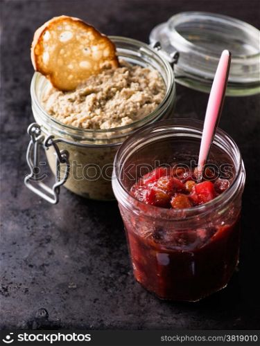 Cranberry relish and mushroom pate over dak backgroud