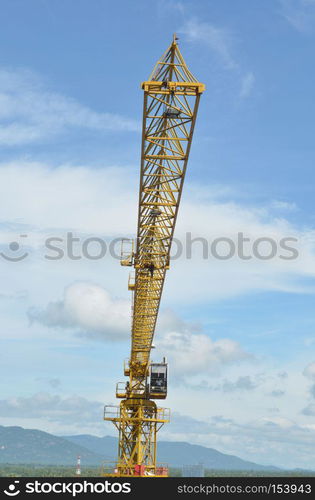 Crane and building working progress, construction site