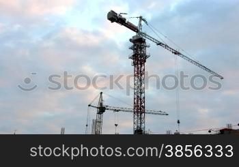 crane and sky construction time lapse. City at a dawn.