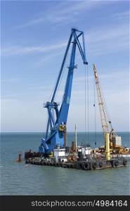 crane barge doing marine heavy lift installation works in the gulf or the sea. crane barge doing marine heavy lift installation works in the gulf or the sea.