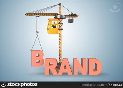 Crane lifting brand letters on commercial concept