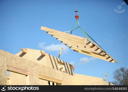 Crane lifting building materials