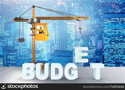 Crane lifting letter in the budgeting concept. Crane lifting letter in budgeting concept