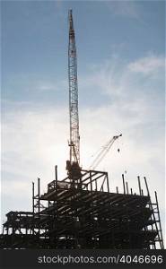 Crane over building under construction