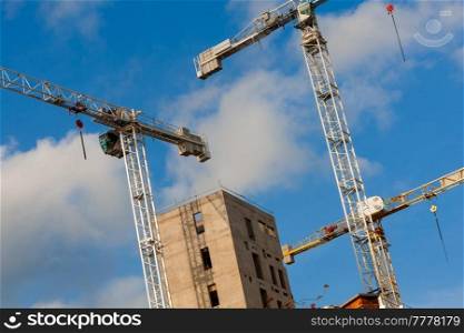 Cranes on a Construction or Building SIte with a blue sky