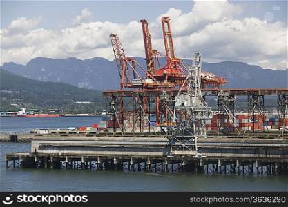 Cranes on pier of Vancouver Harbour British Columbia