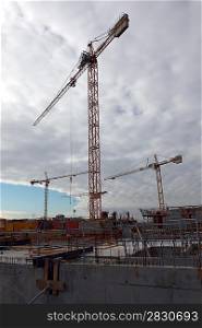 Cranes towering over a construction site