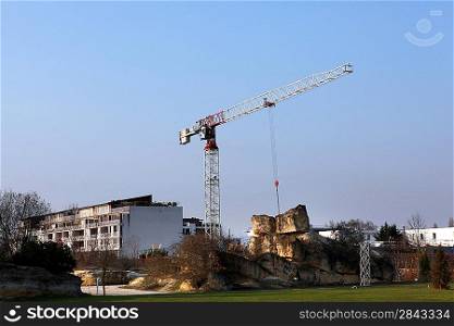 Cranes towering over construction site