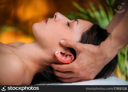 Craniosacral Therapy Massage. CST therapist Massaging of Woman&rsquo;s Head.. CST therapist Massaging Woman&rsquo;s Head. Craniosacral Therapy Massage.